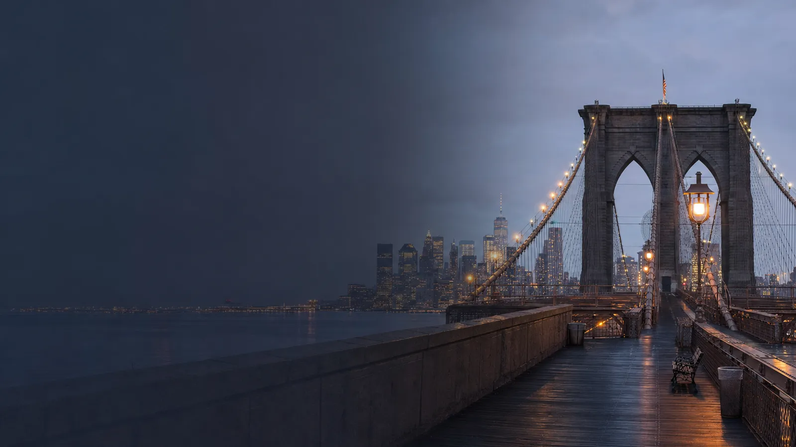 Brooklyn Bridge cables converging toward Manhattan at dusk