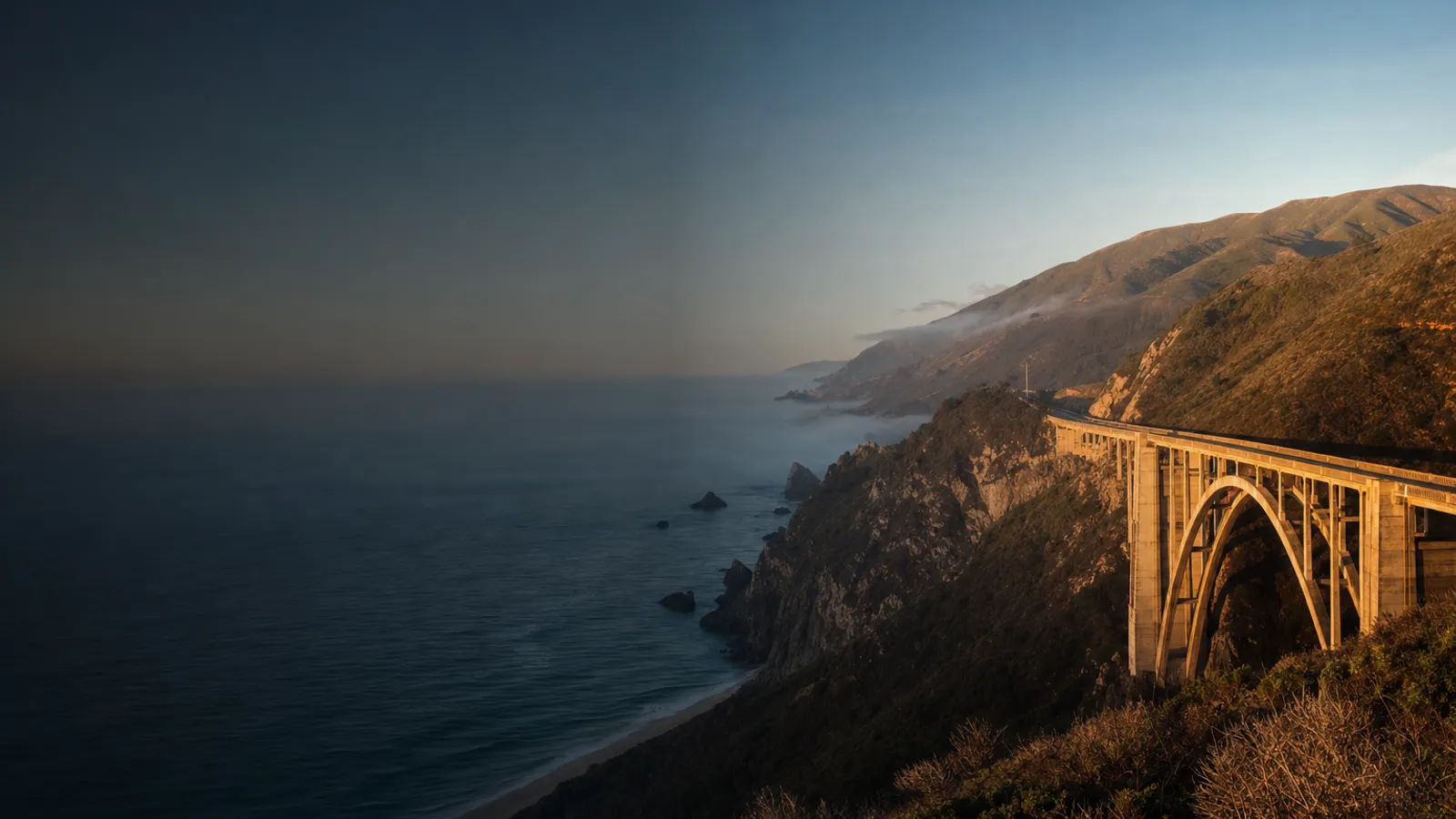 Bixby Bridge arching over its cove on Highway 1