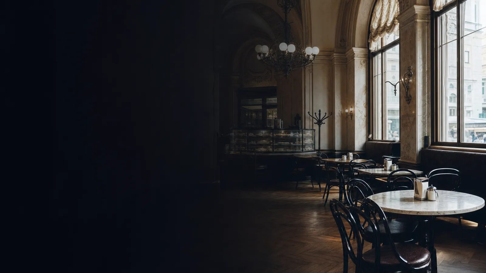 Grand Viennese coffee house with marble tables and chandeliers